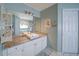 Bathroom featuring granite countertops, a square sink, and a large mirror at 210 Wrights Mill Way, Canton, GA 30115