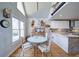 Cozy dining area with a glass table, seating for four, and bright natural light at 210 Wrights Mill Way, Canton, GA 30115