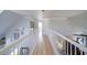 Upstairs hallway with decorative moulding and neutral paint at 210 Wrights Mill Way, Canton, GA 30115