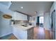 Well-appointed kitchen area with stainless steel appliances and wood flooring at 210 Wrights Mill Way, Canton, GA 30115