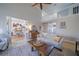Bright living room with high ceilings, open floor plan, and wood-look flooring at 210 Wrights Mill Way, Canton, GA 30115