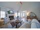 Inviting living room with vaulted ceilings, a fireplace, and natural light at 210 Wrights Mill Way, Canton, GA 30115