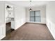 Elegant dining room with wainscoting and modern light fixture at 2180 Sugarbirch Dr, Grayson, GA 30044