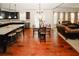 Spacious kitchen with modern appliances, granite counters, and a breakfast nook at 4594 Marching Ln, Fairburn, GA 30213