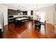 Spacious kitchen with modern appliances, granite counters, and a center island at 4594 Marching Ln, Fairburn, GA 30213