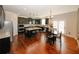 Spacious kitchen with modern appliances, granite counters, and a center island at 4594 Marching Ln, Fairburn, GA 30213