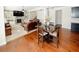 Inviting living room featuring hardwood floors and an open floor plan at 4594 Marching Ln, Fairburn, GA 30213