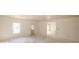 An empty living room is ready for customizations and personalization at 4594 Marching Ln, Fairburn, GA 30213