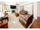 Comfortable living room with fireplace, built-in shelving and hardwood accents at 4594 Marching Ln, Fairburn, GA 30213