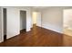 Hardwood floors, closet space, and bathroom access in this bedroom at 728 Birchwood Sw Ln, Marietta, GA 30060