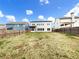 Large backyard with a privacy fence perfect for outdoor activities and entertaining at 507 N Gwinnett St, Buford, GA 30518