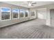 Spacious bedroom with ample natural light and plush carpeting at 507 N Gwinnett St, Buford, GA 30518