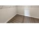 Walk-in closet features wire shelving and ample storage to maximize organization at 507 N Gwinnett St, Buford, GA 30518