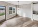 Cozy dining area with backyard views, wood floors, and stylish pendant lighting fixture at 507 N Gwinnett St, Buford, GA 30518