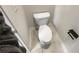A close up of a standard white toilet with chrome hardware at 507 N Gwinnett St, Buford, GA 30518