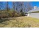 Expansive backyard with natural surroundings, providing a serene and private setting at 11139 Silver Aspen Ct, Hampton, GA 30228