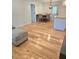 Bright dining room with hardwood floors, a modern light fixture, and dining table at 2308 Baywood Se Dr, Atlanta, GA 30315