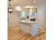 Modern kitchen features white cabinets, stainless steel appliances, and hardwood flooring at 2308 Baywood Se Dr, Atlanta, GA 30315