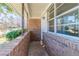 Brick front porch with metal supports offers a cozy outdoor space at 4051 Ester Sw Dr, Atlanta, GA 30331