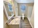 Well-lit bathroom with a modern vanity, granite countertop, and a walk-in shower for a clean and fresh feel at 8014 Bells Ferry Rd, Canton, GA 30114