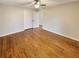 Inviting bedroom features hardwood floors, ample closet space, and a neutral color palette at 8014 Bells Ferry Rd, Canton, GA 30114