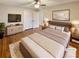 Serene main bedroom showcases a comfortable bed, ample closet space, and soft, natural light at 8014 Bells Ferry Rd, Canton, GA 30114