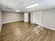 Spacious room with ample closet space and natural light, ideal for a bedroom, office, or entertainment area at 8014 Bells Ferry Rd, Canton, GA 30114