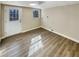 Versatile room featuring natural light and outdoor access, perfect for laundry, storage, or hobby space at 8014 Bells Ferry Rd, Canton, GA 30114