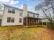 Home's backyard featuring a screened porch with backyard views at 1156 Madison Green Sw Ln, Mableton, GA 30126
