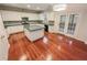 Bright kitchen with white cabinets, stainless steel appliances, and a center island with french doors to the exterior at 1156 Madison Green Sw Ln, Mableton, GA 30126