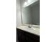 Well-lit bathroom featuring a vanity with a sink, a large mirror, and neutral tones at 1970 Old Dogwood, Jonesboro, GA 30238