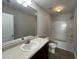 This bathroom features a tub and shower combo, large mirror, and a sink with vanity at 1970 Old Dogwood, Jonesboro, GA 30238