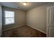 Cozy bedroom with carpet, natural light from the window, and a neutral color scheme at 1970 Old Dogwood, Jonesboro, GA 30238