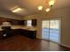 Cozy kitchen with dark cabinetry, modern appliances, and a sliding door to the outdoors at 1970 Old Dogwood, Jonesboro, GA 30238