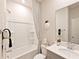 Clean bathroom with a shower-tub combo, modern fixtures, and neutral decor at 363 Denali Butte Ter, Canton, GA 30114