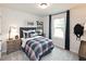 Cozy bedroom with carpeted floors, natural light, and a bed at 363 Denali Butte Ter, Canton, GA 30114