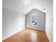 Bedroom featuring large window and light hardwood flooring at 4565 Bridle Point Pkwy, Snellville, GA 30039