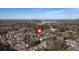 Aerial shot of neighborhood with mature trees close to Tolleson Park under a bright blue sky at 1235 King Springs Se Ct, Smyrna, GA 30080