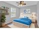 This bedroom offers a bright and airy feel, featuring colorful decor and comfortable furnishings at 1235 King Springs Se Ct, Smyrna, GA 30080
