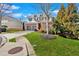 Charming two-story home with brick and siding accents, a well-manicured lawn, and a two-car garage at 1235 King Springs Se Ct, Smyrna, GA 30080