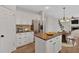 Stylish kitchen featuring stainless steel appliances, granite countertops, and an island with seating at 1235 King Springs Se Ct, Smyrna, GA 30080