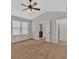 Spacious main bedroom boasts vaulted ceiling, ceiling fan, and access to the ensuite bath with double doors at 1235 King Springs Se Ct, Smyrna, GA 30080