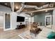 Finished basement has a living area, dining space, kitchenette, laminate flooring, and outside access at 203 Northside Nw Dr, Kennesaw, GA 30144