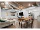 Finished basement features a living area, dining space, kitchenette, and laminate flooring at 203 Northside Nw Dr, Kennesaw, GA 30144