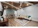 The finished basement features a living area, dining space, kitchenette, and access to the outside at 203 Northside Nw Dr, Kennesaw, GA 30144