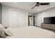 Neutral bedroom with a ceiling fan, closet and walkout access to the outdoors at 203 Northside Nw Dr, Kennesaw, GA 30144
