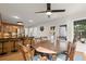 Open-concept breakfast nook with views into the kitchen and backyard at 203 Northside Nw Dr, Kennesaw, GA 30144