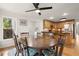 Bright breakfast nook with hardwood floors and views into the kitchen at 203 Northside Nw Dr, Kennesaw, GA 30144