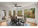 Cozy breakfast nook with a round wooden table, seating for six, and natural light at 203 Northside Nw Dr, Kennesaw, GA 30144