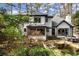 Charming two-story home with a well-manicured lawn and a lovely back patio, perfect for outdoor entertaining at 203 Northside Nw Dr, Kennesaw, GA 30144